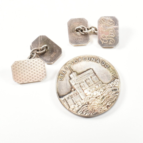 376 - A collection of silver and gem set jewellery and a coin. The jewellery to include a 1970s silver, CZ... 