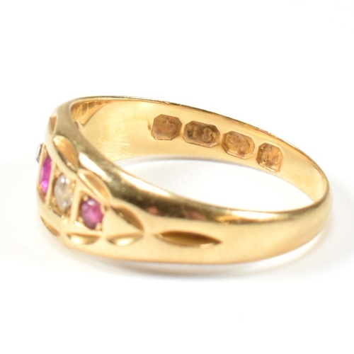 38 - A Victorian hallmarked 18ct gold ruby and diamond gypsy ring. The ring set with three rubies and two... 