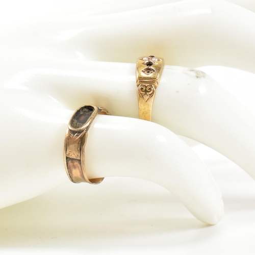 384 - A Victorian hallmarked 15ct gold and gem set ring and a gold band ring. The rings to include a Victo... 