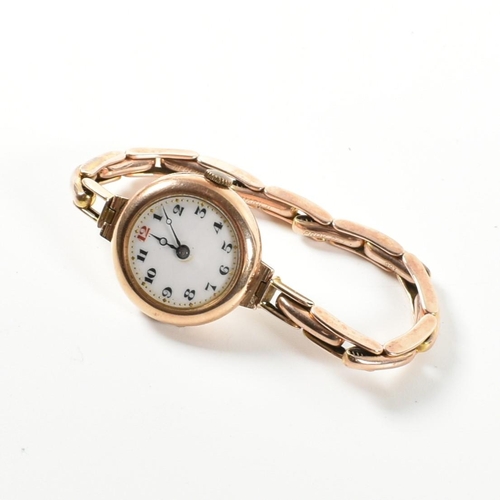 386 - An early 20th century 9ct gold ladies dress watch. The watch having a white dial with Arabic numeral... 