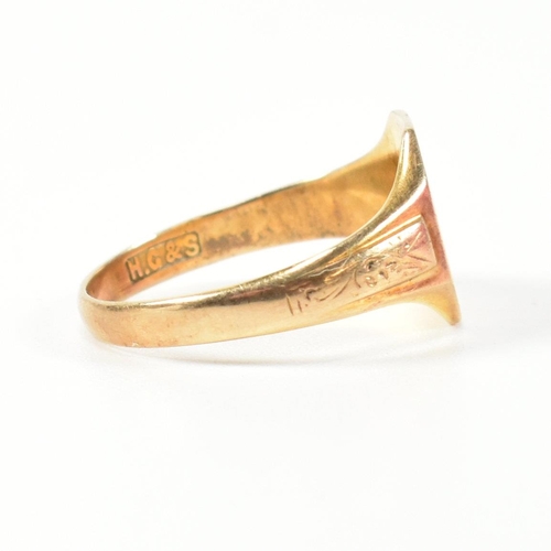 393 - A hallmarked 9ct gold engraved signet ring. The signet ring having an octagonal head engraved with t... 