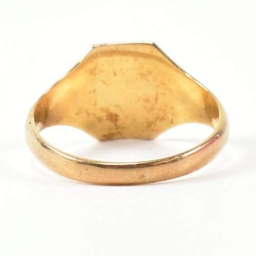 393 - A hallmarked 9ct gold engraved signet ring. The signet ring having an octagonal head engraved with t... 