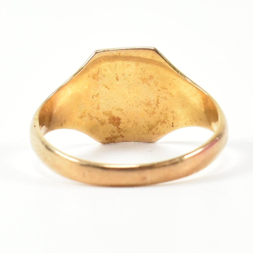 393 - A hallmarked 9ct gold engraved signet ring. The signet ring having an octagonal head engraved with t... 