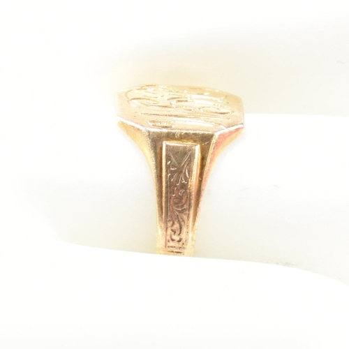 393 - A hallmarked 9ct gold engraved signet ring. The signet ring having an octagonal head engraved with t... 