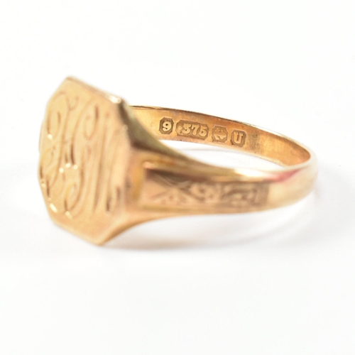 393 - A hallmarked 9ct gold engraved signet ring. The signet ring having an octagonal head engraved with t... 