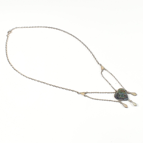 405 - An Arts and Crafts style sterling silver and abalone pendant necklace. The necklace strung with an a... 