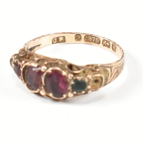 411 - A Victorian hallmarked 9ct gold and gem set half hoop ring. The ring set with flat cut red, white, p... 