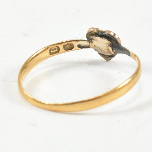 412 - A hallmarked 22ct gold band ring and a hallmarked 14ct gold and seed pearl heart ring. The Victorian... 