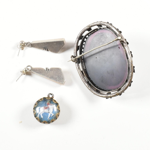 416 - A signed Navajo silver and gem set necklace and earring suite together with a carved paste cameo and... 