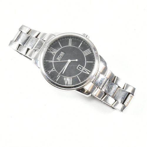 417 - A Hugo Boss stainless steel wristwatch. The watch having Roman numeral hour markers with date window... 