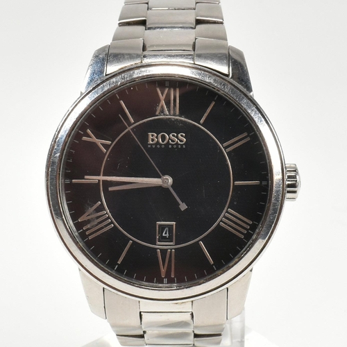 417 - A Hugo Boss stainless steel wristwatch. The watch having Roman numeral hour markers with date window... 