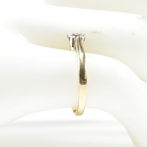 430 - A hallmarked 9ct gold and diamond solitaire ring. The ring having a single illusion set round brilli... 