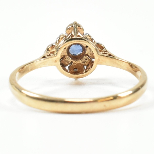 431 - A hallmarked 9ct gold, sapphire and diamond cluster ring. The ring set with a central round cut sapp... 