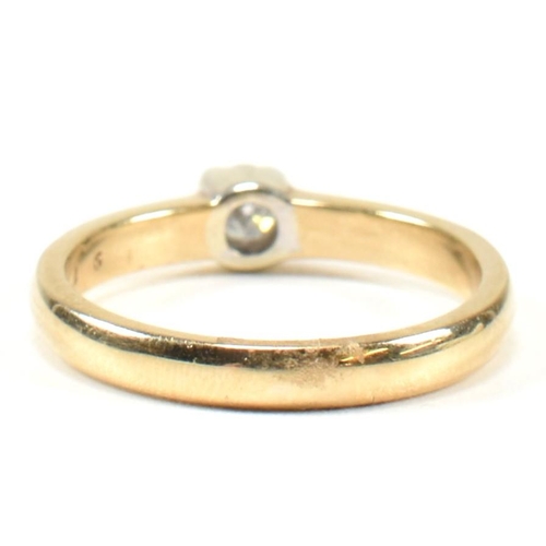 434 - A hallmarked 9ct gold and diamond solitaire ring. The ring set with a single half bezel set round br... 