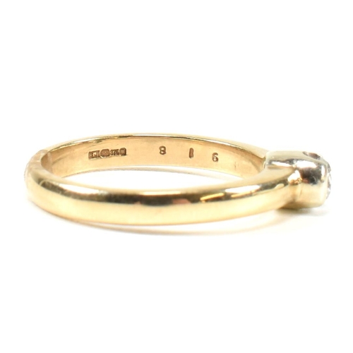 434 - A hallmarked 9ct gold and diamond solitaire ring. The ring set with a single half bezel set round br... 