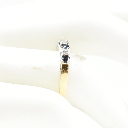 437 - A hallmarked 18ct gold, diamond and sapphire half hoop ring. The ring set with three shared claw rou... 