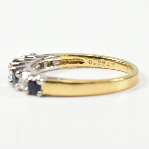 437 - A hallmarked 18ct gold, diamond and sapphire half hoop ring. The ring set with three shared claw rou... 