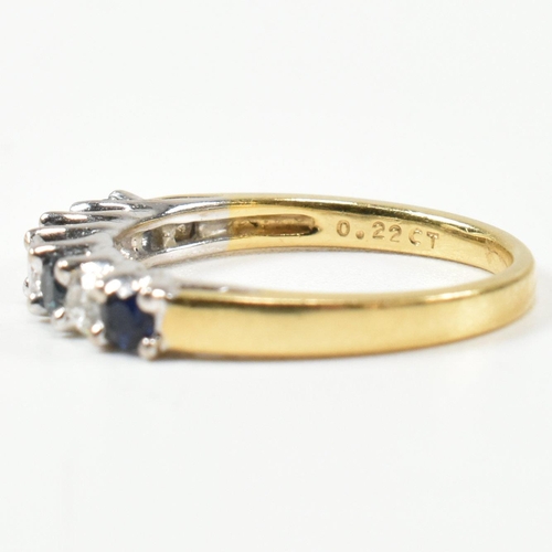 437 - A hallmarked 18ct gold, diamond and sapphire half hoop ring. The ring set with three shared claw rou... 