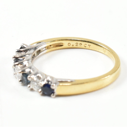 437 - A hallmarked 18ct gold, diamond and sapphire half hoop ring. The ring set with three shared claw rou... 