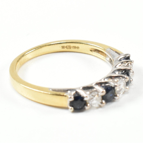 437 - A hallmarked 18ct gold, diamond and sapphire half hoop ring. The ring set with three shared claw rou... 