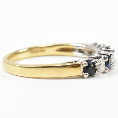 437 - A hallmarked 18ct gold, diamond and sapphire half hoop ring. The ring set with three shared claw rou... 