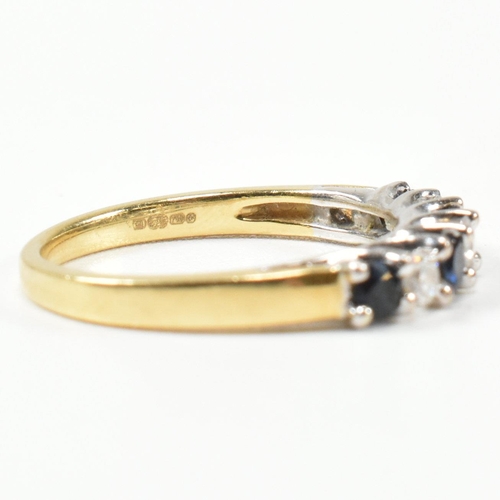 437 - A hallmarked 18ct gold, diamond and sapphire half hoop ring. The ring set with three shared claw rou... 