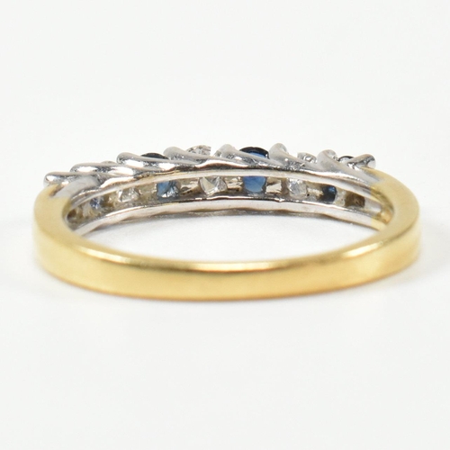 437 - A hallmarked 18ct gold, diamond and sapphire half hoop ring. The ring set with three shared claw rou... 