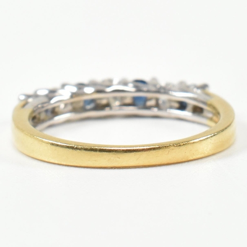 437 - A hallmarked 18ct gold, diamond and sapphire half hoop ring. The ring set with three shared claw rou... 