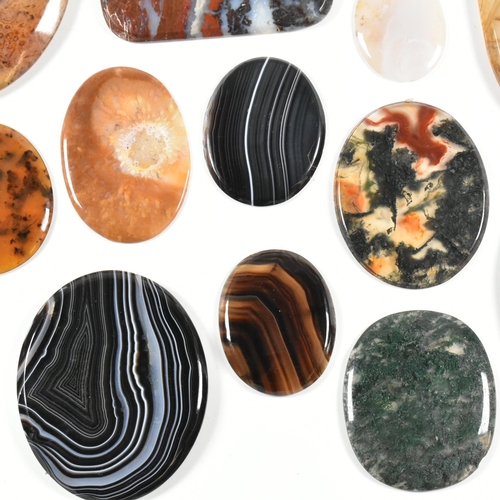 438 - A collection of banded agate, moss agate, bloodstone and jasper specimen slices. Largest 10.7cm. Tot... 