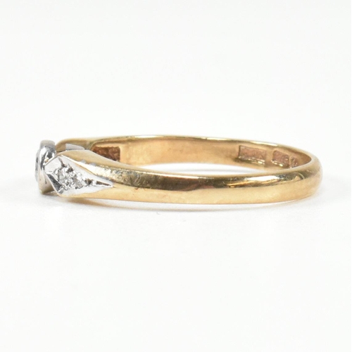 440 - A hallmarked 9ct gold and diamond ring. The ring set with a central bezel set round brilliant cut di... 