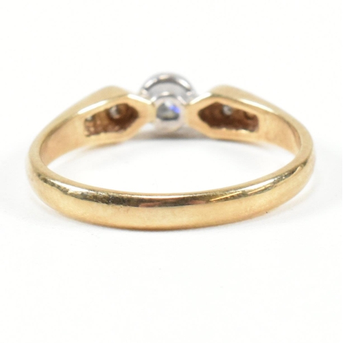 440 - A hallmarked 9ct gold and diamond ring. The ring set with a central bezel set round brilliant cut di... 