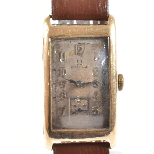 451 - Early 20th century Omega 9ct gold wristwatch. The elongated dial with Arabic numbers and seconds dia... 