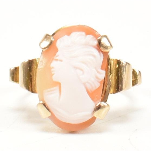 452 - Two 9ct gold shell cameo rings. The rings set with carved shell cameo busts. Both marked 9ct. Sizes ... 