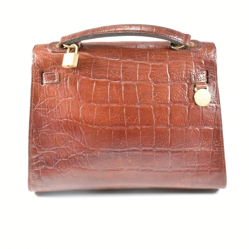 55 - A Mulberry brown Congo Nile leather Kelly bag with crossbody strap. The brown leather Mulberry bag h... 