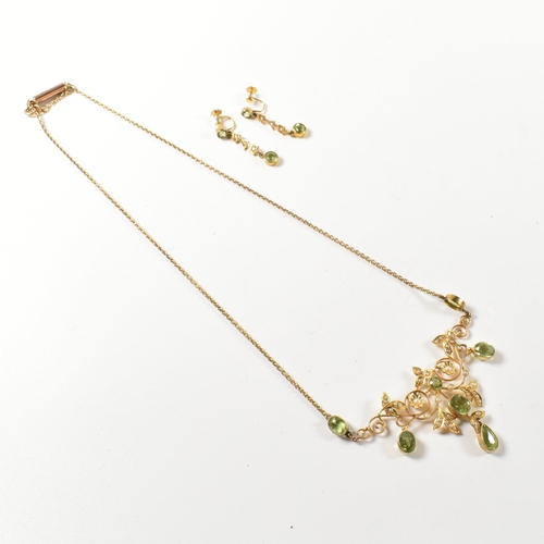 6 - An Edwardian 9ct gold peridot and pearl necklace and earring suite. The fringe necklace having bezel... 