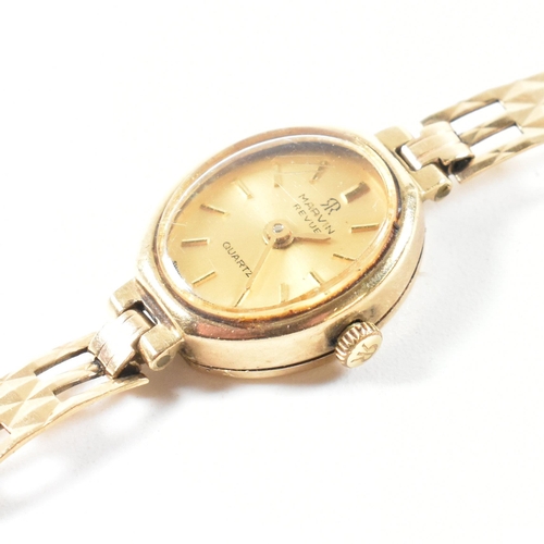 70 - A hallmarked 9ct gold Marvin Revue wristwatch. The watch having a champagne dial with baton number m... 