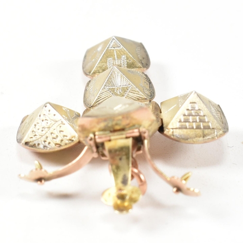 71 - An early 20th century gold and silver masonic puzzle ball cross pendant. Weight 7.5. Measures 4cm un... 