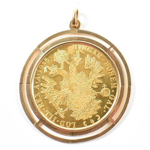 72 - An 18ct gold mounted Austrian 1915 Gold Austrian 4 Ducat coin restrike pendant. The Austrian coin mo... 