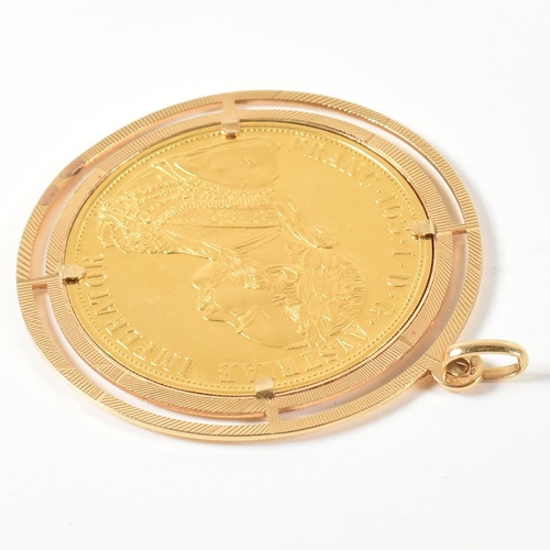 72 - An 18ct gold mounted Austrian 1915 Gold Austrian 4 Ducat coin restrike pendant. The Austrian coin mo... 