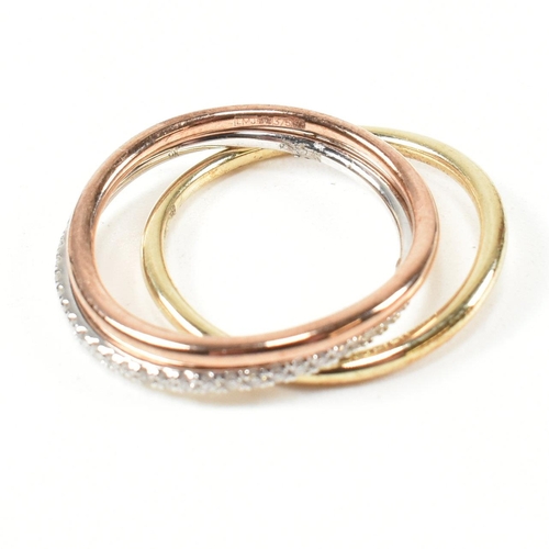 73 - A hallmarked 9ct gold and diamond tri colour gold stacking ring set. Size N. Weighs 3.2g. All weight... 