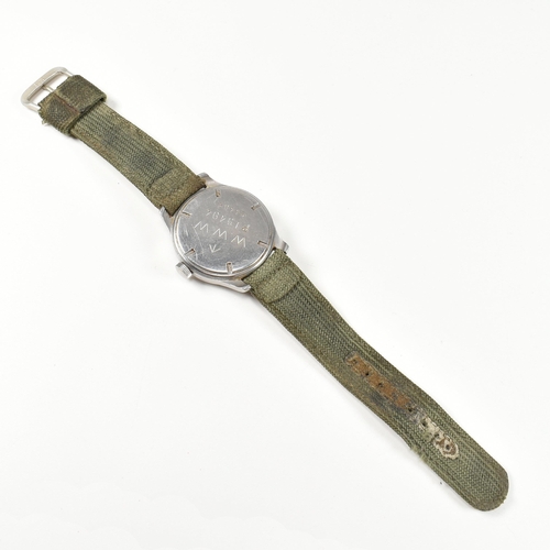 77 - A World War II military Cyma Dirty Dozen wristwatch. The watch having a circular black dial with rad... 