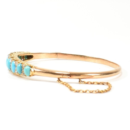 8 - A late Victorian gold, turquoise and diamond hinged bangle. The gold hinged bangle set with nine gra... 