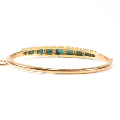 8 - A late Victorian gold, turquoise and diamond hinged bangle. The gold hinged bangle set with nine gra... 