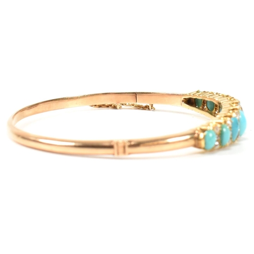 8 - A late Victorian gold, turquoise and diamond hinged bangle. The gold hinged bangle set with nine gra... 