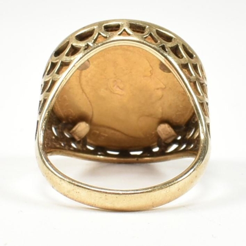 80 - A 9ct gold mounted half sovereign ring. The ring having a1906 half sovereign coin with the St George... 