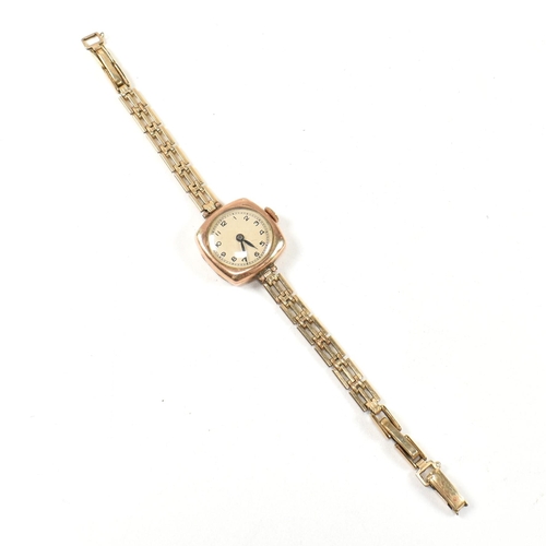 88 - A 9ct gold ladies dress watch set to a rolled gold gate link strap. Total weight 14.1g. All weights,... 