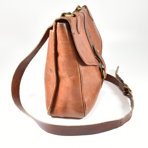 330 - A Mulberry oak leather cartridge crossbody bag. The bag having an oak coloured grain leather exterio... 