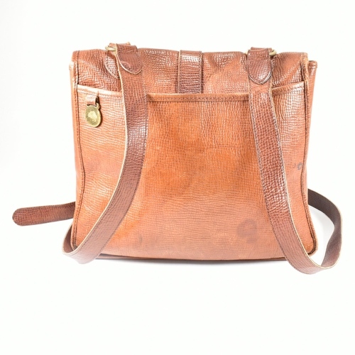 330 - A Mulberry oak leather cartridge crossbody bag. The bag having an oak coloured grain leather exterio... 