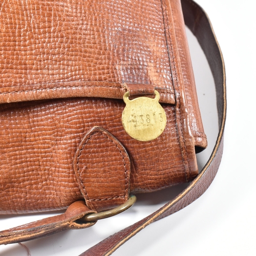 330 - A Mulberry oak leather cartridge crossbody bag. The bag having an oak coloured grain leather exterio... 