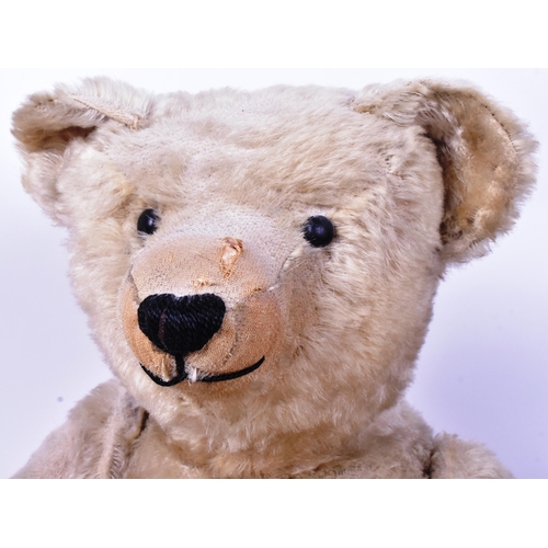 100 - Teddy Bear - a large early 20th century German (likely Steiff ) made teddy bear. Pale golden mohair,... 